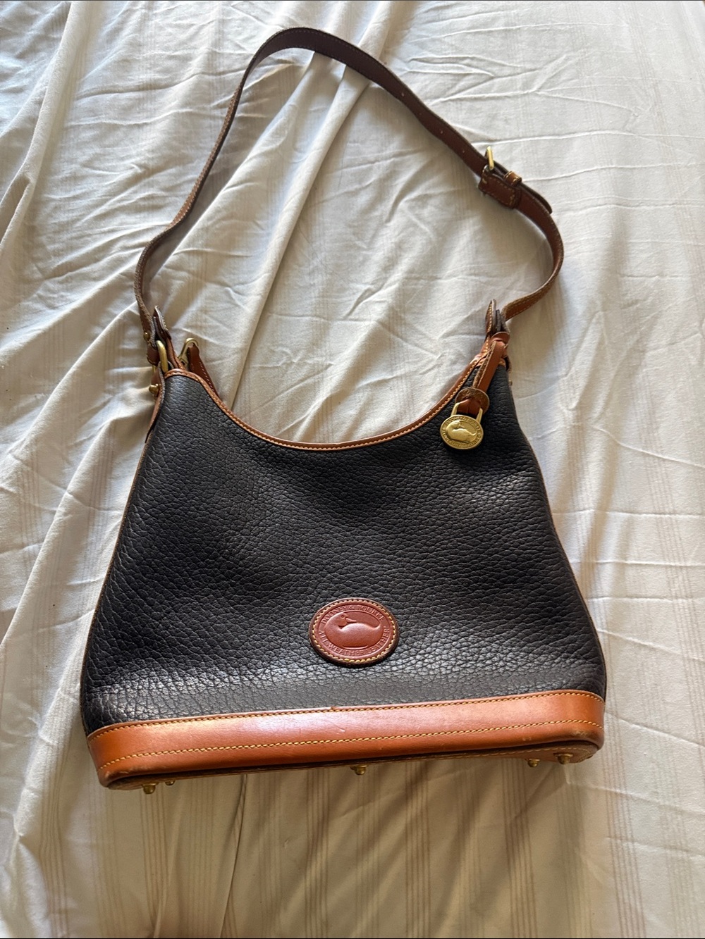 Dooney & Bourke Black Pebbled Leather Shoulder Bag with Brown Trim
